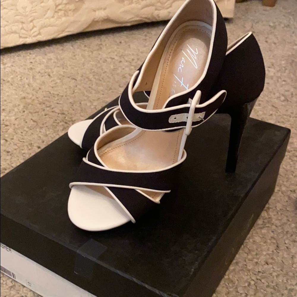 Black and white heels .. New with box .